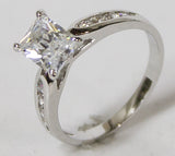 Women's Rhodium Plated Dress Ring Emerald Cut CZ 102