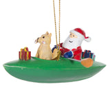 Adorable Santa And Dog In Kayak Christmas Ornament
