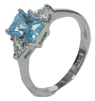 Women's Rhodium Plated Dress Ring Emerald Cut Blue CZ 009